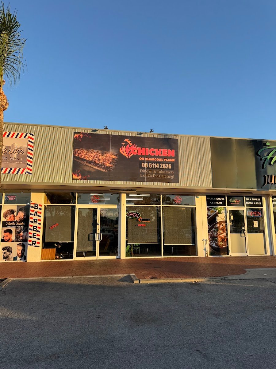 Chicken on Charcoal Flame